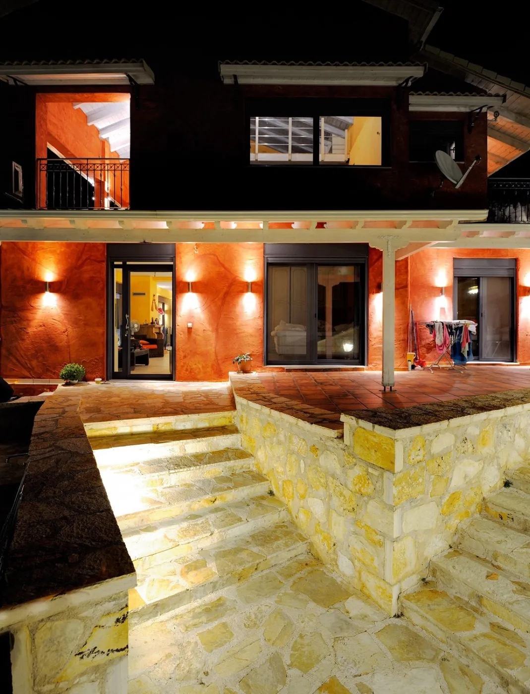 Sivota villa stone terrace by night